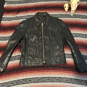 Heavy duty vintage black leather motorcycle/scooter jacket size 44